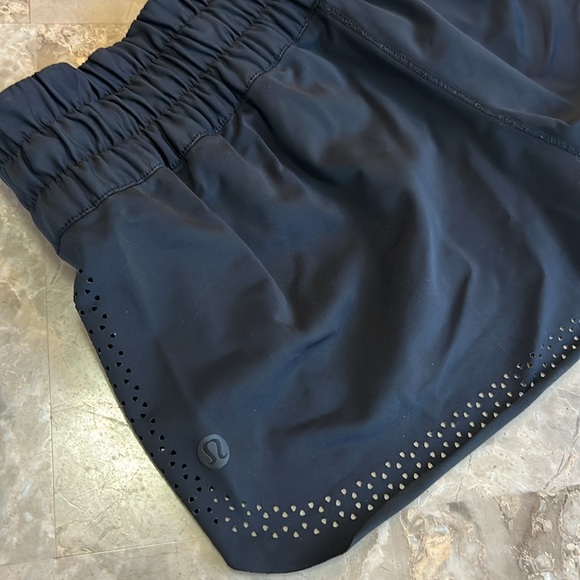 Lululemon black unlined shorts with decorative holes. Rare find! Super cute! - Picture 3 of 7